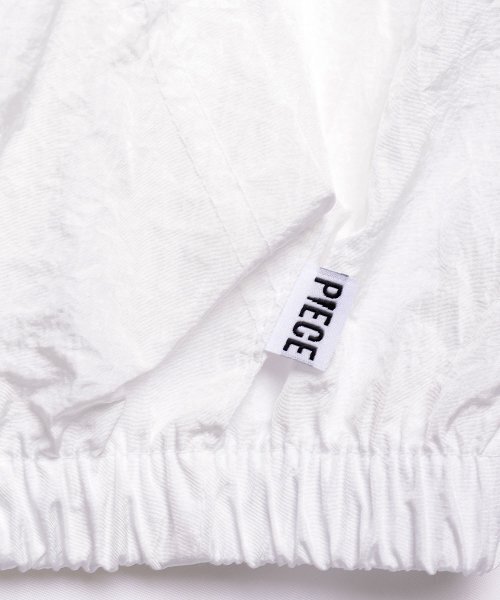 PIECEMAKER(ピースメーカー)の「SHIMMERING NYLON TRACK JACKET (IVORY)(ナイロンジャケット・レディース・その他・FREE)」の5枚目の写真
