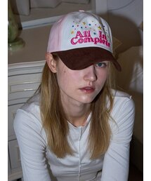 ALLINCOMPLETE（オールインコンプリート）の「ステラレトロキャップ（ブラウン＆チェリーブロッサム）（キャップ）」