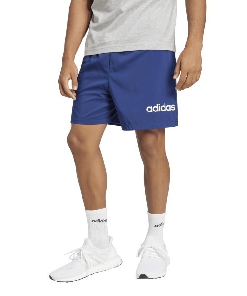 adidas(アディダス)の「アディダス adidas エッセンシャルズ リニア ロゴ ショーツ(その他パンツ・メンズ・ブラック/ダークブルー・S/M/L/LL/3L)」の1枚目の写真