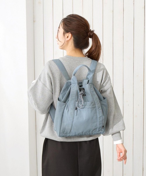 ROOTOTE(ルートート)の「ルートート / リュック 2way トートバッグ A4 撥水 軽量 通勤 通学 マザーズバッグ SC.セオルー.ドローストリング-B(バックパック/リュック・レディース・グレー/レッド/ブラック/タン・FREE)」の1枚目の写真