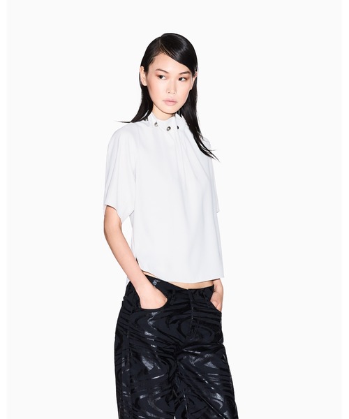 ARMANI EXCHANGE(アルマーニエクスチェンジ)の「【A|X アルマーニ エクスチェンジ】ジュエルデザインネック ブラウス(シャツ/ブラウス・レディース・アイボリー/ブラック・LARGE/MEDIUM/SMALL/X-LARGE/X-SMALL)」の1枚目の写真