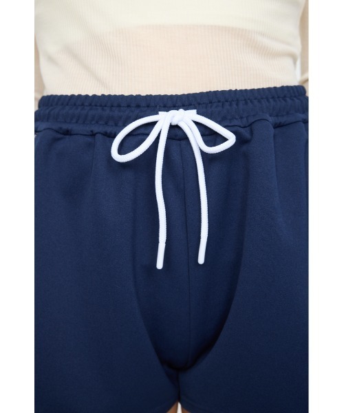 MOUSSY(マウジー)の「UMBRO PIPING トラックショーツ(スウェットパンツ・レディース・マジェンタ/ネイビー・FREE)」の12枚目の写真