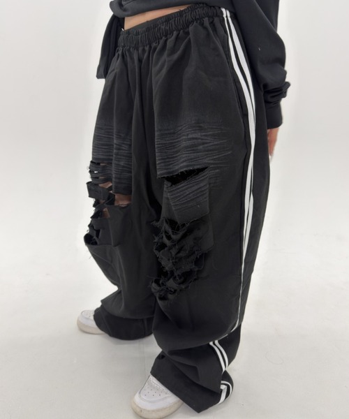 .KOM(ドットコム)の「A'GEM/9 × .kom 『.KOM/ドットケーオーエム』Destroy Track Pants/デストロイトラックパンツ(スウェットパンツ・レディース・ブラック/ブラウン・FREE)」の11枚目の写真