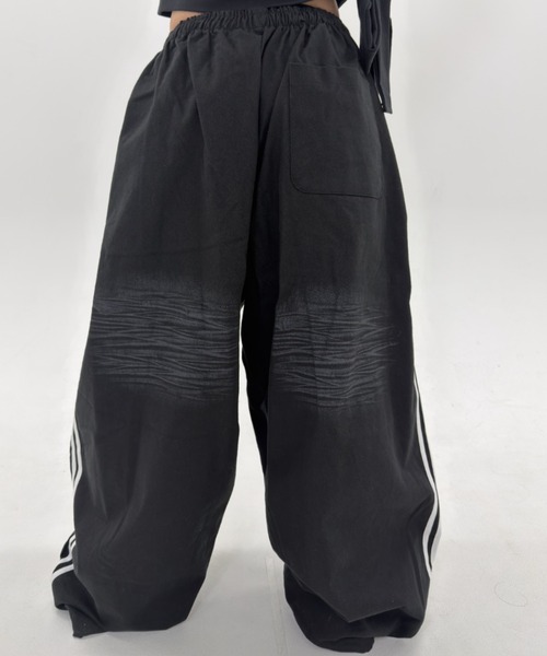 .KOM(ドットコム)の「A'GEM/9 × .kom 『.KOM/ドットケーオーエム』Destroy Track Pants/デストロイトラックパンツ(スウェットパンツ・レディース・ブラック/ブラウン・FREE)」の12枚目の写真