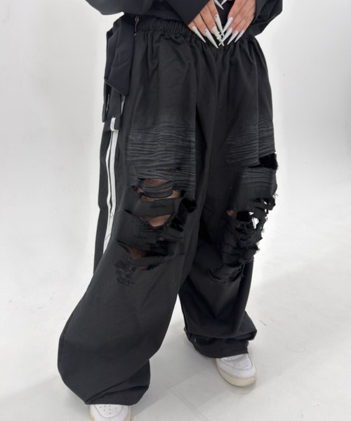 .KOM(ドットコム)の「A'GEM/9 × .kom 『.KOM/ドットケーオーエム』Destroy Track Pants/デストロイトラックパンツ(スウェットパンツ・レディース・ブラック/ブラウン・FREE)」の13枚目の写真