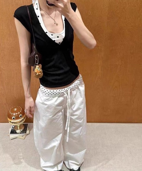 Ritzy(リッツィー)の「ドット柄 ホルターネック レイヤード風 T シャツ(Tシャツ/カットソー・レディース・ブラック/ブラック系・M/L)」の1枚目の写真