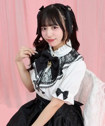 ラッフルバックレースアップブラウス