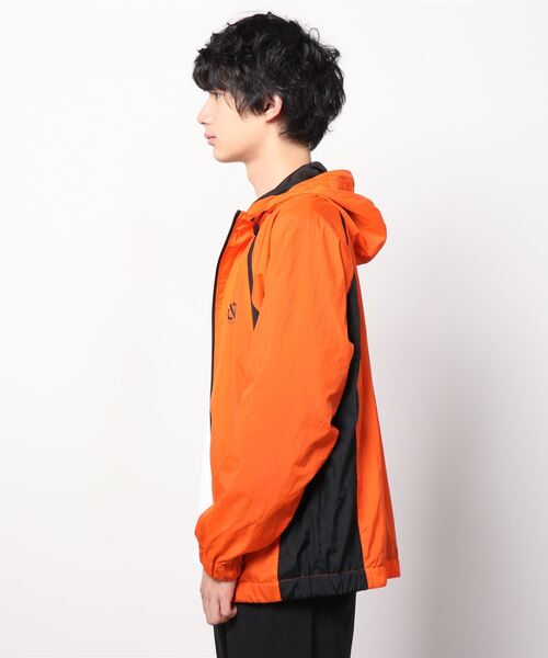 Back Channel(バックチャンネル)の「NYLON TRACK HOODED JACKET(ナイロンジャケット・メンズ・ブラック/オレンジ/ベージュ系その他・MEDIUM/LARGE/X-LARGE/XX-LARGE)」の6枚目の写真