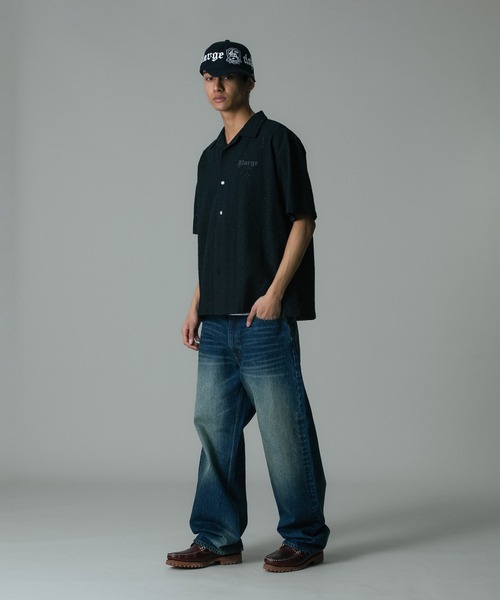 XLARGE(エクストララージ)の「WRAP AROUND LOGO CAP(キャップ・メンズ・ネイビー/ブラック・ONE SIZE)」の4枚目の写真
