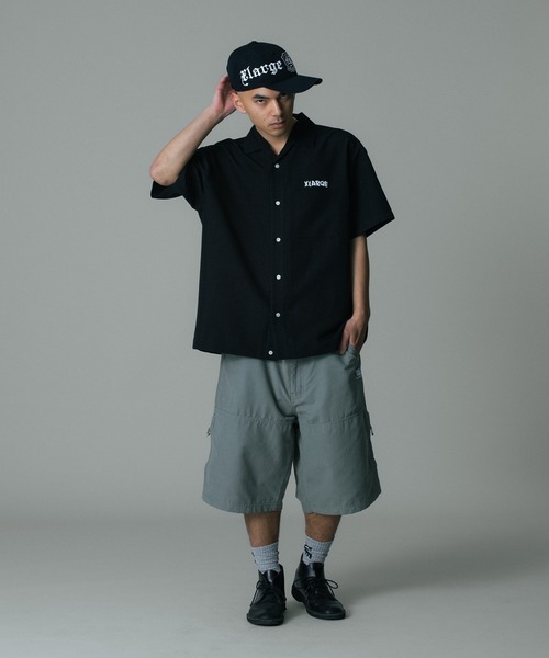 XLARGE(エクストララージ)の「WRAP AROUND LOGO CAP(キャップ・メンズ・ネイビー/ブラック・ONE SIZE)」の6枚目の写真