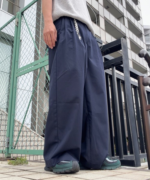 UNDERSTATEMENTs(アンダーステイトメント)の「【ユニセックス】3タックステッチワイドカーブパンツ(スラックス・メンズ・グリーン/ブラック/ネイビー・LARGE/MEDIUM/SMALL)」の18枚目の写真