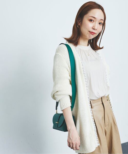 le.coeur blanc（ルクールブラン）の「パールツキカーディガン（カーディガン/ボレロ・レディース・ネイビー/オフホワイト・38）」の8枚目の写真