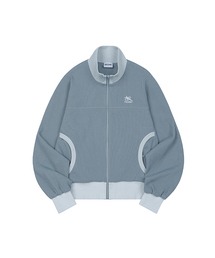 ODD STUDIO（オッドスタジオ）の「スポーティワッフルラウンドポケットジップアップ - ダスティブルー（ナイロンジャケット）」