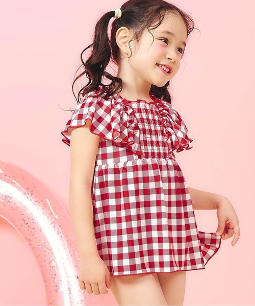 apres les cours(アプレレクール)の「【UVカット】シャーリングフリルワンピース水着_ジュニア対応(水着・キッズ・ピンク/レッド/ブラック/サックスブルー/オレンジ/イエロー・80/90/100/110/120/130/140)」の1枚目の写真