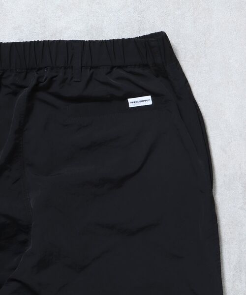 FFEIN（フェイン）の「【FFEIN(フェイン)】ナイロントレッキングストレートパンツ / シンプル 刺繍 ドローコード オーバーサイズ（カーゴパンツ・メンズ・ネイビー/ブラック/アイボリー/グレー/ブラウン・SMALL/MEDIUM/LARGE）」の18枚目の写真