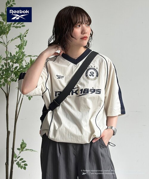 Reebok(リーボック)の「【Reebok】接触冷感ユニフォームプルオーバー(シャツ/ブラウス・レディース・アイボリー/ネイビー・MEDIUM/LARGE)」の2枚目の写真