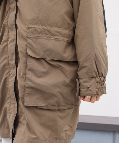 WILD THINGS(ワイルドシングス)の「WILD THINGS/ワイルドシングス シャモニーオーバーコート CHAMONIX OVER COAT WTW21201PA(マウンテンパーカー・レディース・オリーブ/ライトベージュ・S)」の13枚目の写真
