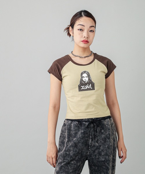 X-girl（エックスガール）の「FACE RAGLAN BABY TEE（Tシャツ