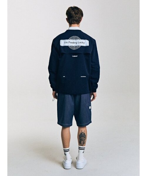 CONTEMENT(コンテメント)の「「運が良い気分」SOLOTEX ウィンドブレーカー(Tシャツ/カットソー・メンズ・ネイビー・MEDIUM/LARGE)」の1枚目の写真