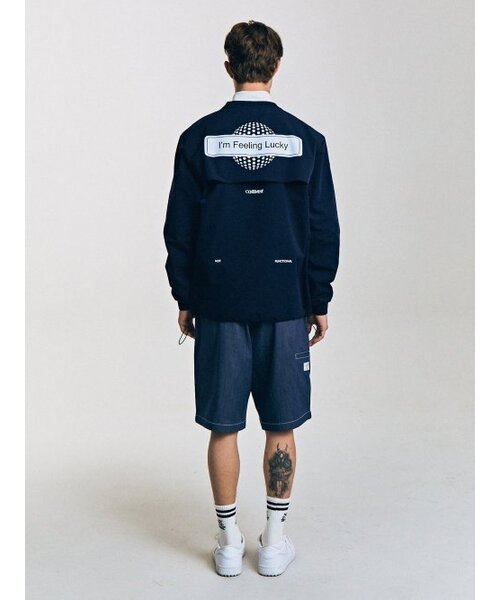 CONTEMENT(コンテメント)の「「運が良い気分」SOLOTEX ウィンドブレーカー(Tシャツ/カットソー・メンズ・ネイビー・MEDIUM/LARGE)」の3枚目の写真