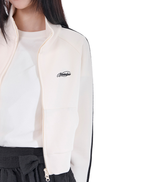 ALKI ALKA(アルキアルカ)の「Nostalgia Track Jacket (Ivory)(ナイロンジャケット・レディース・アイボリー・FREE)」の3枚目の写真
