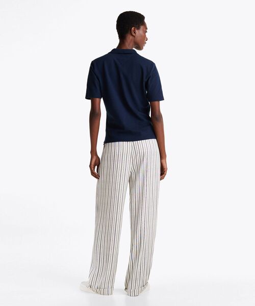 TOMMY HILFIGER（トミーヒルフィガー）の「レギュラーカラーピケショートスリーブポロ（ポロシャツ・レディース・ベージュ/ライトブルー/マルチ/ホワイト/ネイビー/ライトグリーン/ベージュ系・X-SMALL/SMALL/MEDIUM/LARGE）」の12枚目の写真