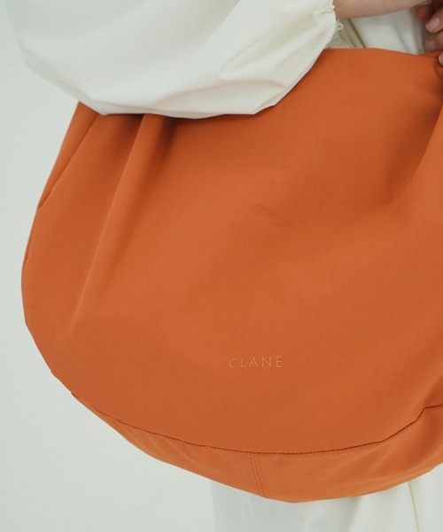 CLANE(クラネ)の「REVERSIBLE ROUND BAG(ショルダーバッグ・レディース・ブラック/オレンジ・F)」の12枚目の写真