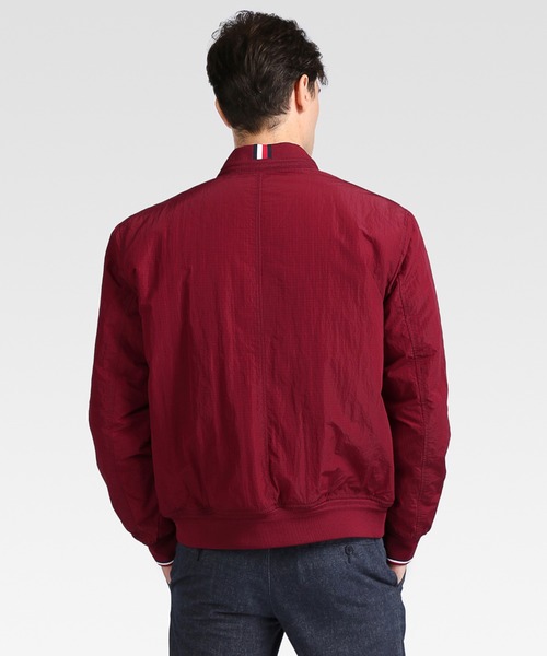 TOMMY HILFIGER(トミーヒルフィガー)の「ライトウェイトボンバージャケット(MA-1・メンズ・ブラック/レッド・SMALL/MEDIUM/LARGE/X-LARGE)」の5枚目の写真