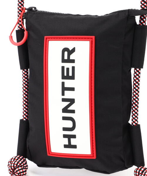 HUNTER（ハンター）トラベル リップストップ リサイクル ナイロン フォンポーチ - ブラック/レッド ボックス ロゴ（ショルダーバッグ）｜HUNTER（ハンター）