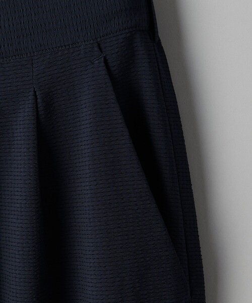 UNITED ARROWS(ユナイテッドアローズ)の「DotAir ドットエア サッカー ヘムコード 2プリーツパンツ -吸水速乾・ストレッチ-(その他パンツ・メンズ・ネイビー/ブラック・L/M/S)」の13枚目の写真