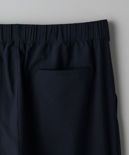 UNITED ARROWS(ユナイテッドアローズ)の「DotAir ドットエア サッカー ヘムコード 2プリーツパンツ -吸水速乾・ストレッチ-(その他パンツ・メンズ・ネイビー/ブラック・L/M/S)」の14枚目の写真