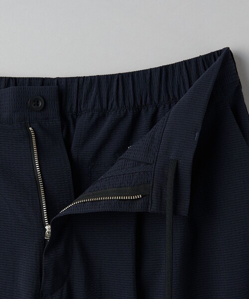UNITED ARROWS(ユナイテッドアローズ)の「DotAir ドットエア サッカー ヘムコード 2プリーツパンツ -吸水速乾・ストレッチ-(その他パンツ・メンズ・ネイビー/ブラック・L/M/S)」の15枚目の写真