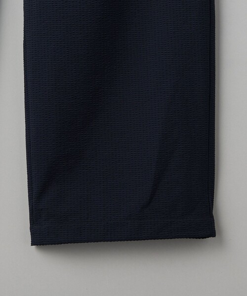 UNITED ARROWS(ユナイテッドアローズ)の「DotAir ドットエア サッカー ヘムコード 2プリーツパンツ -吸水速乾・ストレッチ-(その他パンツ・メンズ・ネイビー/ブラック・L/M/S)」の16枚目の写真