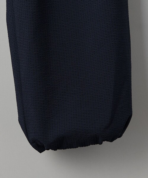 UNITED ARROWS(ユナイテッドアローズ)の「DotAir ドットエア サッカー ヘムコード 2プリーツパンツ -吸水速乾・ストレッチ-(その他パンツ・メンズ・ネイビー/ブラック・L/M/S)」の18枚目の写真