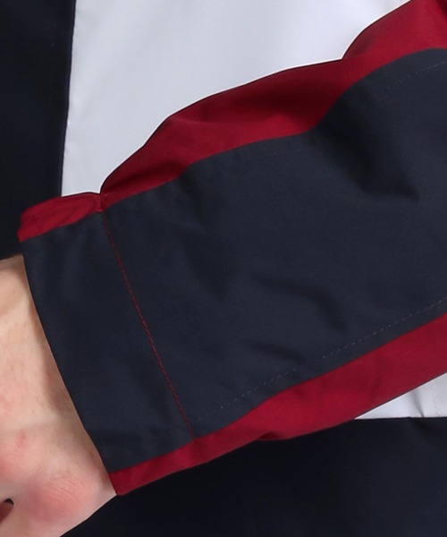 TOMMY HILFIGER（トミーヒルフィガー）の「ライトウェイトカラーブロックジャケット（マウンテンパーカー・メンズ・ネイビー・SMALL/MEDIUM/LARGE/X-LARGE）」の5枚目の写真