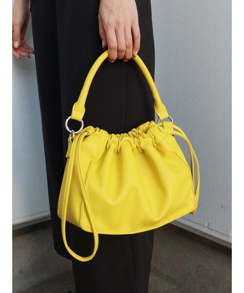 MURUA(ムルーア)の「2WAYハンドルドロストバッグ(ハンドバッグ・レディース・ブラック/イエロー・FREE)」の1枚目の写真