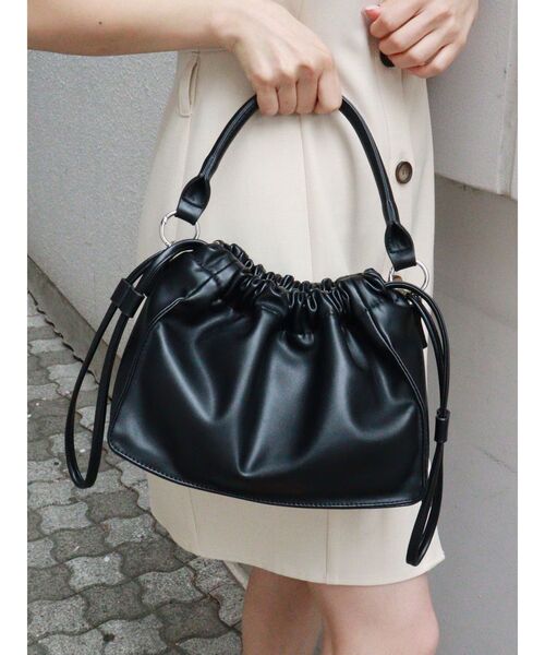 MURUA(ムルーア)の「2WAYハンドルドロストバッグ(ハンドバッグ・レディース・ブラック/イエロー・FREE)」の2枚目の写真