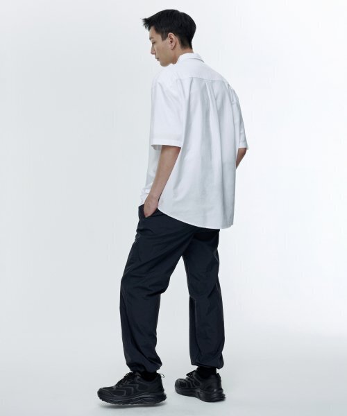 MUSINSA STANDARD（ムシンサスタンダード）の「ナイロンワイドストリングパンツ[ダークグレー]（スウェットパンツ・メンズ・その他・26/28/30/32/34/36/38/40/42）」の6枚目の写真