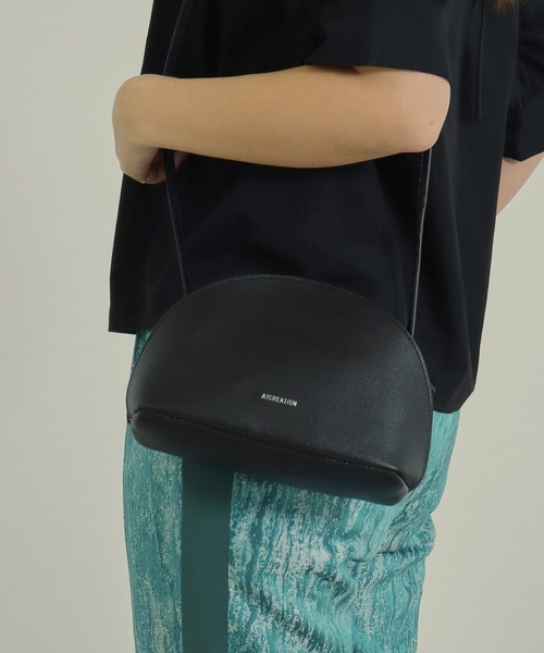 AULI（アウリィ）の「ラウンドZIPショルダーバッグ（ショルダーバッグ・レディース・ブラック/ベージュ/イエロー/イエロー×グリーン・FREE）」の2枚目の写真