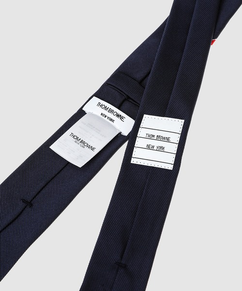 THOM BROWNE（トムブラウン）の「CLASSIC TIE IN ENGINEERED RWB GEM ANCHOR ICON TIE JACQUARD（ネクタイ・メンズ・ネイビー・ONE SIZE）」の3枚目の写真