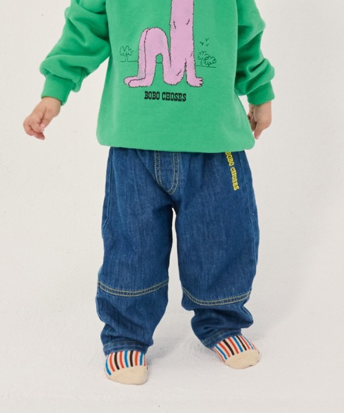 BOBO CHOSES(ボボショーズ)の「Taxi Saurus Tag denim pants(デニムパンツ・キッズ・ダークブルー・12MONTH)」の1枚目の写真