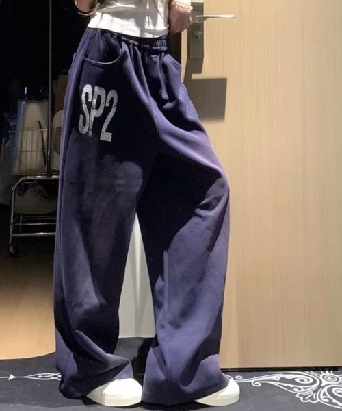 Ritzy(リッツィー)の「ヴィンテージプリント ワイドスウェットパンツ(スウェットパンツ・レディース・ネイビー・S/M)」の6枚目の写真