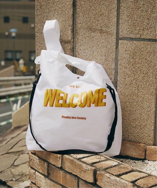 JOURNAL STANDARD（ジャーナルスタンダード）の「【MISHIMA MART/ミシママート】ウェルカム プリント バック（エコバッグ/サブバッグ・メンズ・ホワイト系その他/ホワイト・FREE）」の2枚目の写真