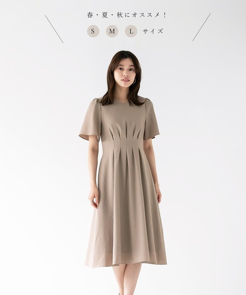 WHITE JOOLA（ホワイトジョーラ）の「再々入荷【暑い季節も快適リネン調シリーズ】洗濯機で洗える！麻調メランジ・タックフレアーワンピース（ワンピース・レディース・ネイビー/モカ・L/M/S）」の4枚目の写真