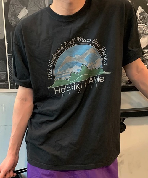 NOWLE(ノウル)の「【NOWLE】80sヴィンテージライク ハワイグラフィック プリント 半袖 Tシャツ(Tシャツ/カットソー・メンズ・ブラック・LARGE/MEDIUM/X-LARGE)」の1枚目の写真