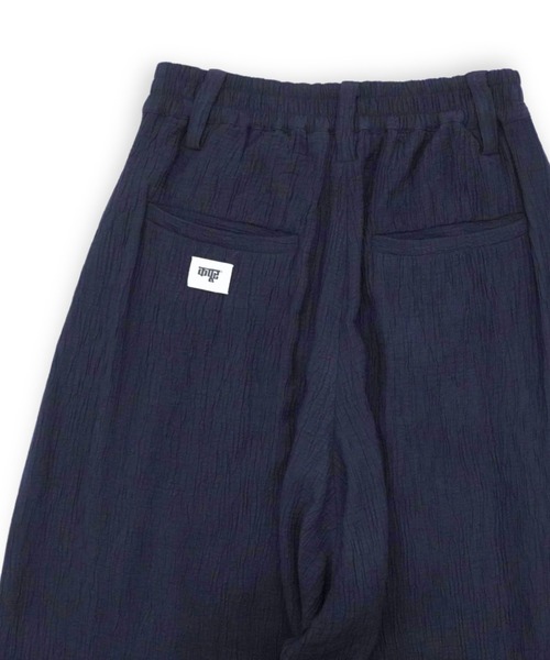 Dhruv Kapoor(ドゥルーフ・カプール)の「【Dhruv Kapoor】 TEXTURED DRAPE PANTS(その他パンツ・メンズ・ネイビー・SMALL)」の7枚目の写真