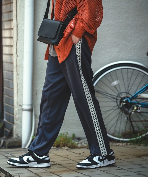 NULL（ヌル）の「【NULL】テープ使い ライン トラックパンツ（その他