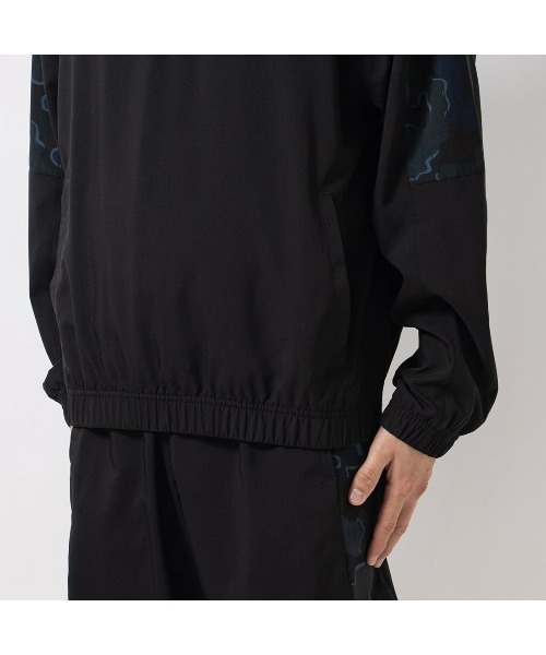 Reebok（リーボック）の「トレイン モーション カモ 1/4 ジップトップ / TRAIN MOTION CAMO 1/4 ZIP TOP（その他トップス・メンズ・ベージュ/ブラック・LARGE/MEDIUM/SMALL/XX-LARGE/X-LARGE）」の6枚目の写真