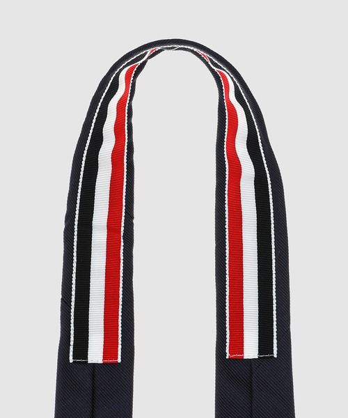 THOM BROWNE(トムブラウン)の「CLASSIC TIE IN ENGINEERED RWB GEM HECTOR TIE JACQUARD(ネクタイ・メンズ・ネイビー・ONE SIZE)」の4枚目の写真