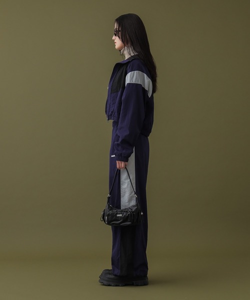 DISPATCHER NO.8(ディスパッチャーナンバーエイト)の「ナイロントラックジャケット / セットアップ対応(ブルゾン・レディース・ブラック/ネイビー・ONE SIZE)」の9枚目の写真